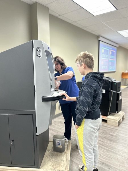 Glory Global showing their machines in working action at Career Explorations